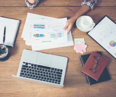 Top view of young Businessman woman hands reviewing analyzing f